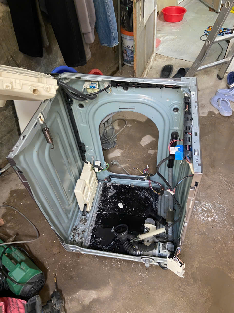 Sửa máy giặt lồng ngang ( cửa trước) Tại TpHCM - Thay chảng ba