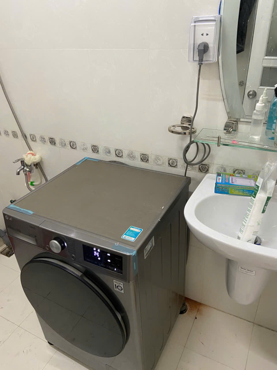 thay chảng ba máy giặt cửa trước + vệ sinh lồng giặt