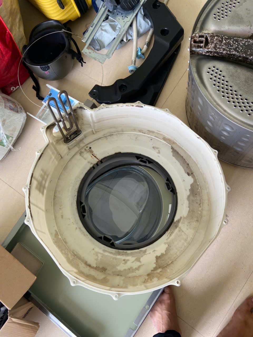 thay chảng ba máy giặt cửa trước + vệ sinh lồng giặt